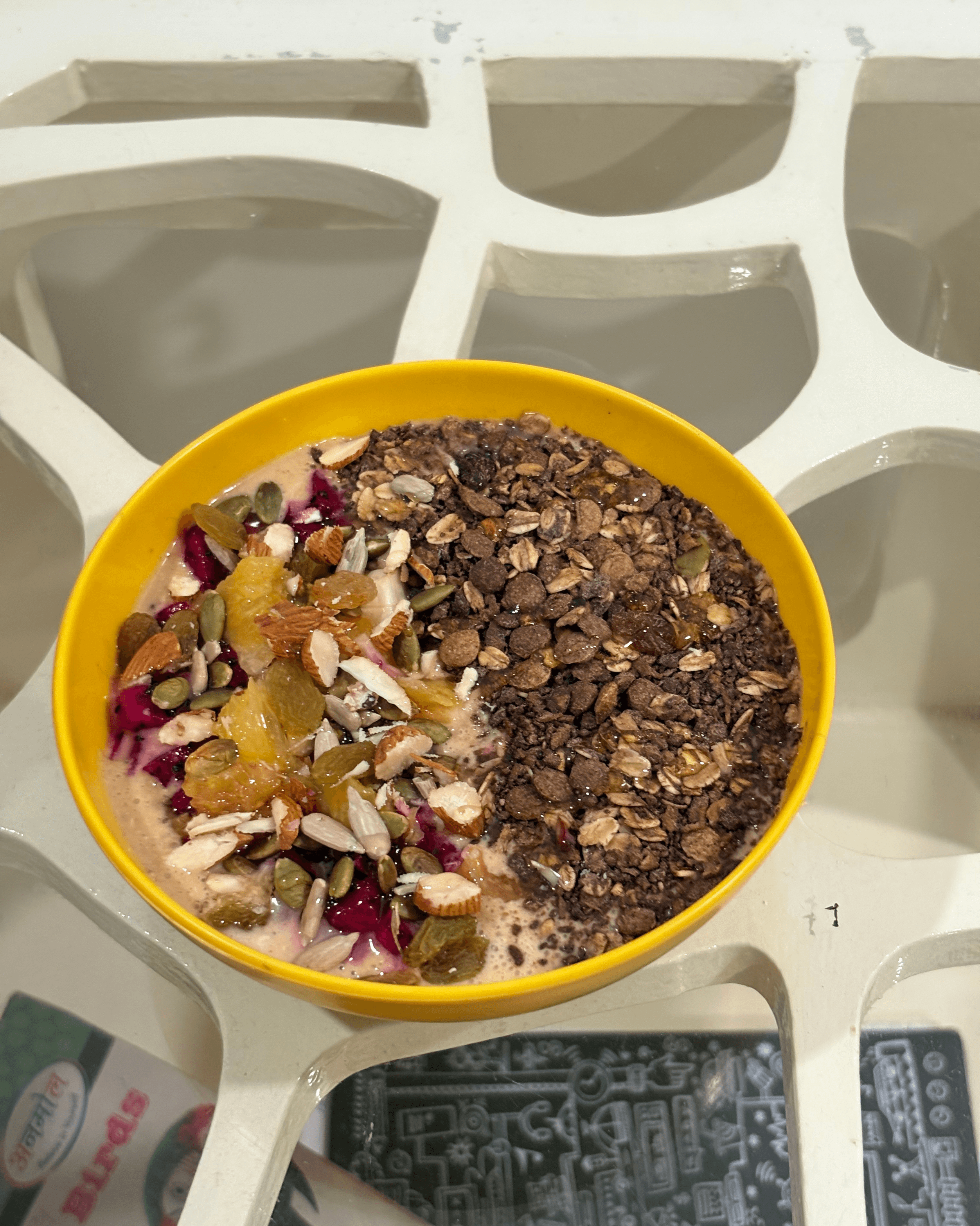 Healthy smoothie bowl topped with fruits